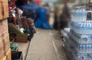 Pedestrians and businesses compete for space on Thimphu footpaths